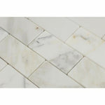 Load image into Gallery viewer, Calacatta Gold 2x4 Beveled Marble Mosaic

