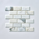 Load image into Gallery viewer, Calacatta Gold 2x4 Beveled Marble Mosaic Flooring Tilezz