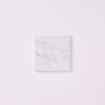 Load image into Gallery viewer, Carrara White Marble 4x4 Tumbled Tile
