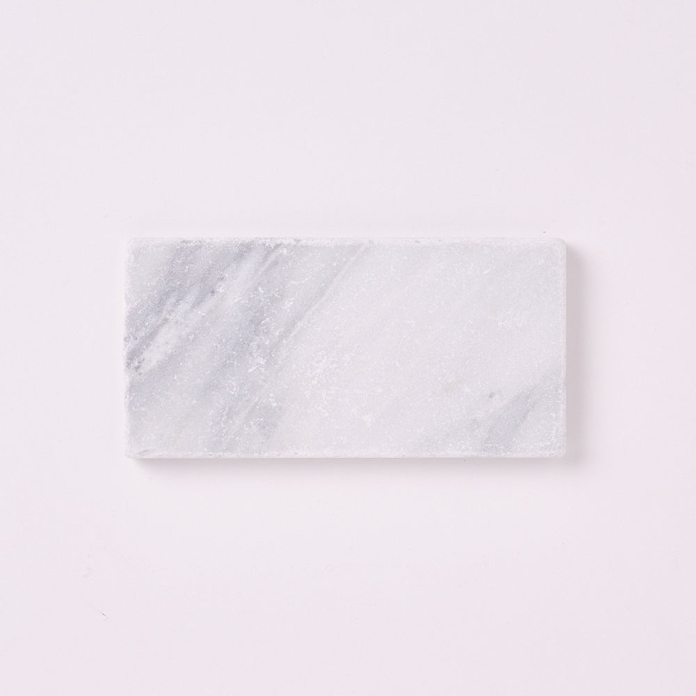 Carrara White 3×6 Tumbled Marble Tile