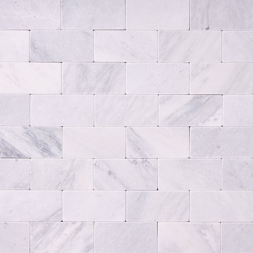 Carrara White 3×6 Tumbled Marble Tile