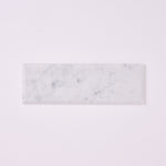 Load image into Gallery viewer, Carrara White 4x12 Beveled Marble Tile
