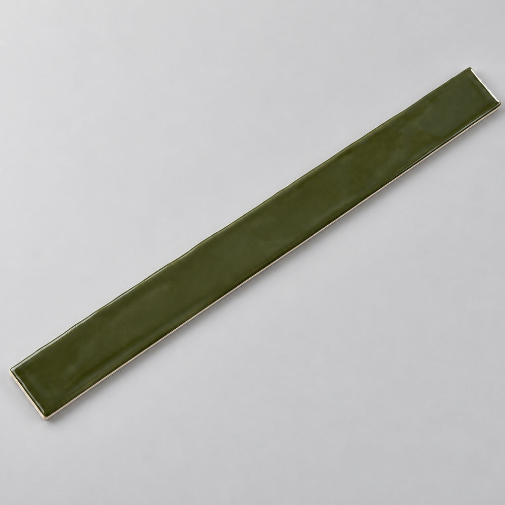 Ambrya emerald 2x20 glossy ceramic tile — angled full tile view
