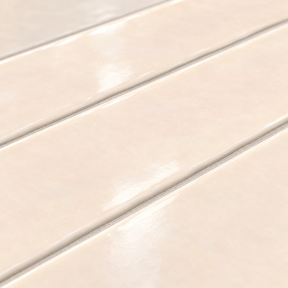 Ambrya opal 2x20 glossy ceramic tile — angled glaze detail