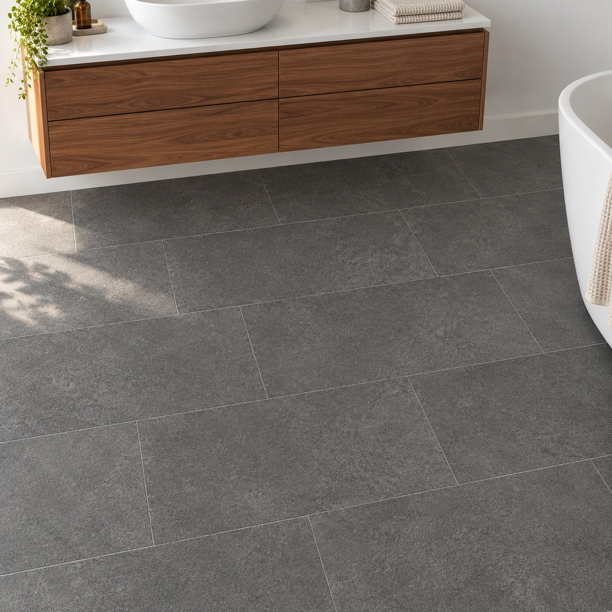 Anthraconic 12x24 R Porcelain Tile Matte — bathroom floor and vanity visualization
