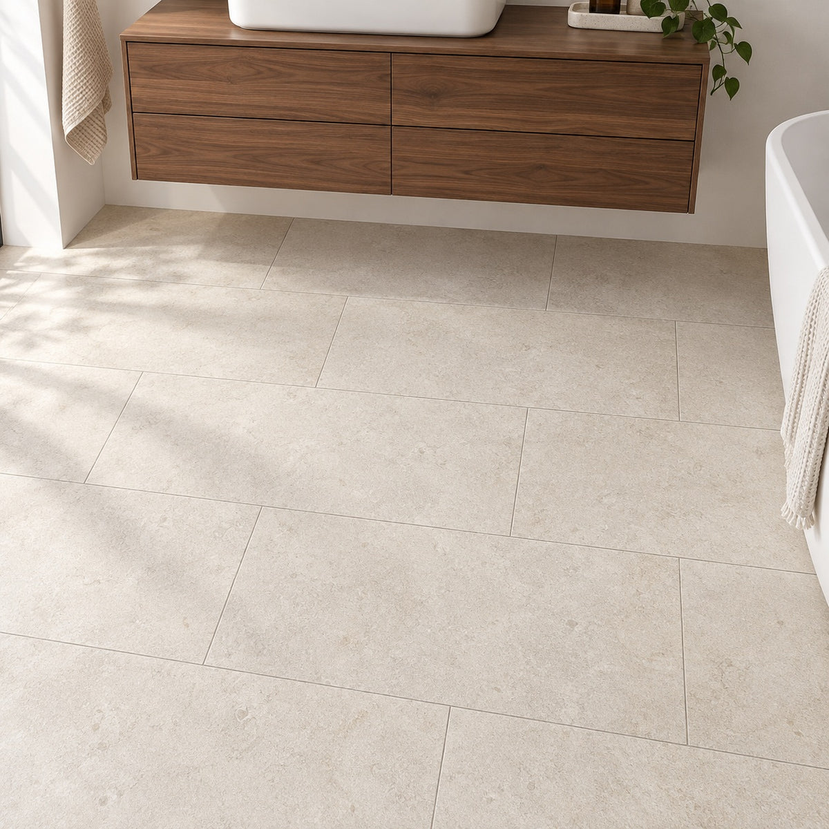 Ashtone Arena 12x24 R Porcelain Tile — bathroom floor and vanity visualization