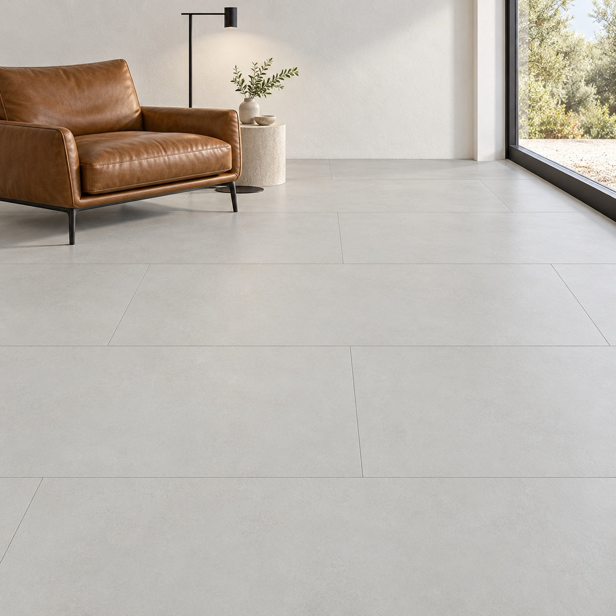 Momento Cement Ice 24x48 porcelain installed floor room scene