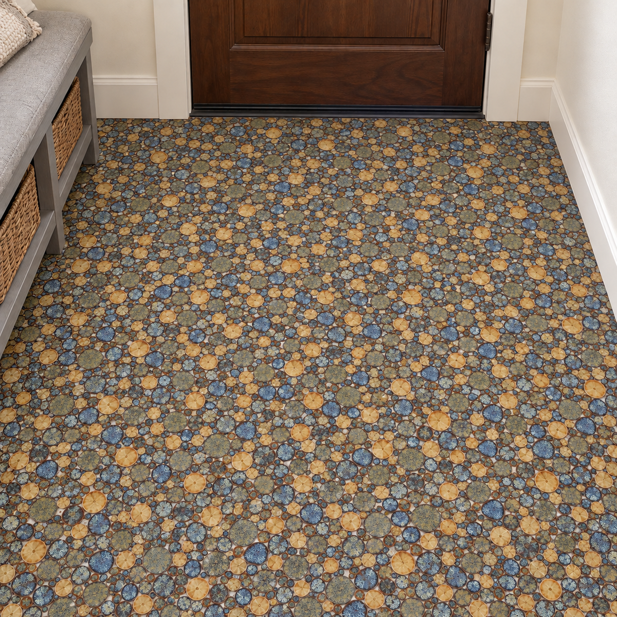 Nevis Brown Lentil pebble mosaic floor with varied olive, honey and speckled navy glazed chips in an entryway