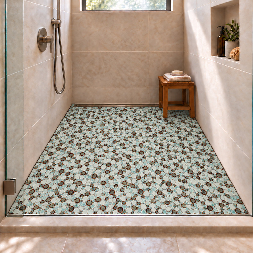 Nevis Dusty Jade Green Pebble Mosaic small irregular reactive-glaze porcelain mosaic installed on shower floor