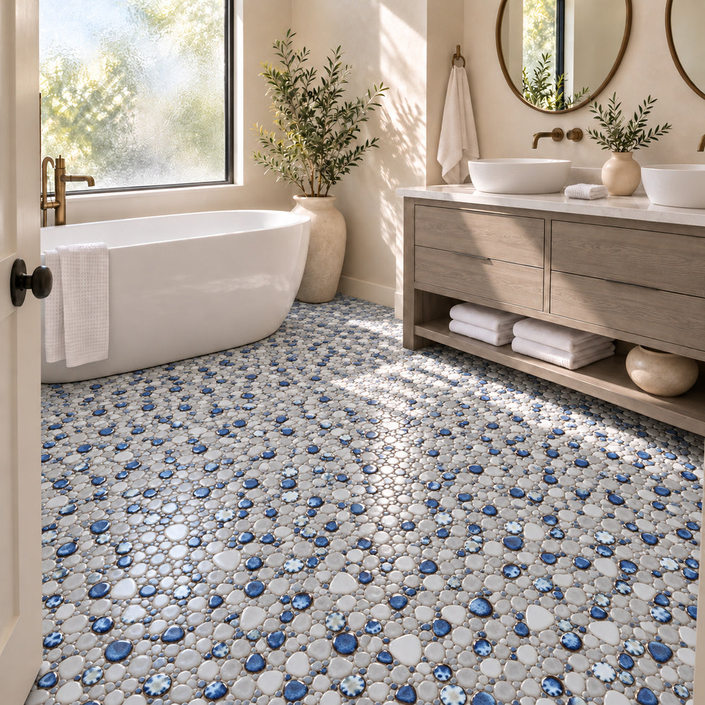 Nevis Gray Dawn Pebble Mosaic installed on a bathroom floor, small irregular reactive-glaze mosaic chips