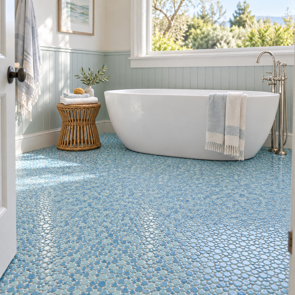 Nevis Jewel Blue Pebble Mosaic installed bathroom floor with small mosaic chips