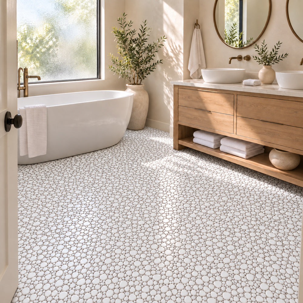 Nevis Whisper White Pebble Mosaic small irregular mosaic installed on bathroom floor