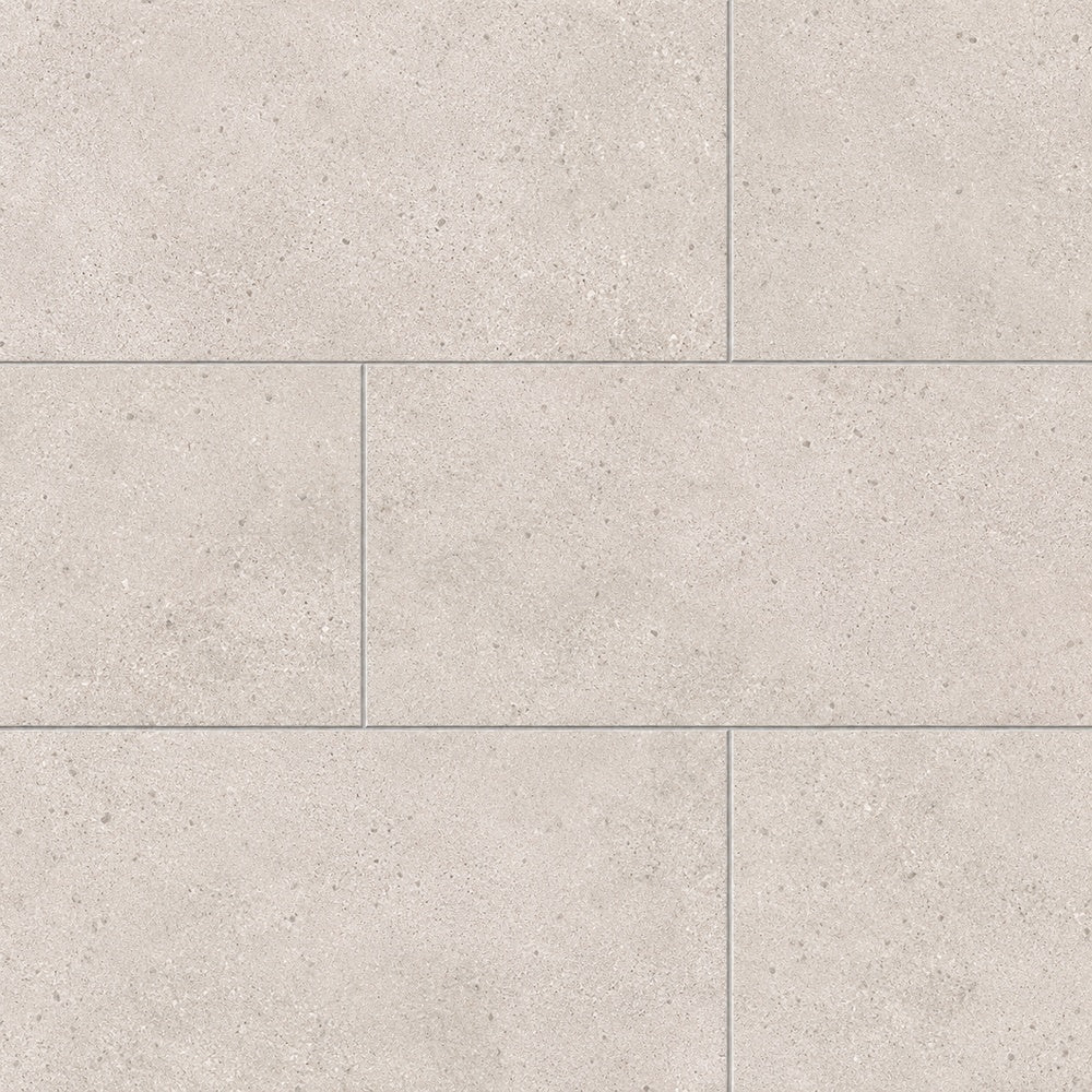 Nordell Tan 12x24 Porcelain Tile large-format installed close-up