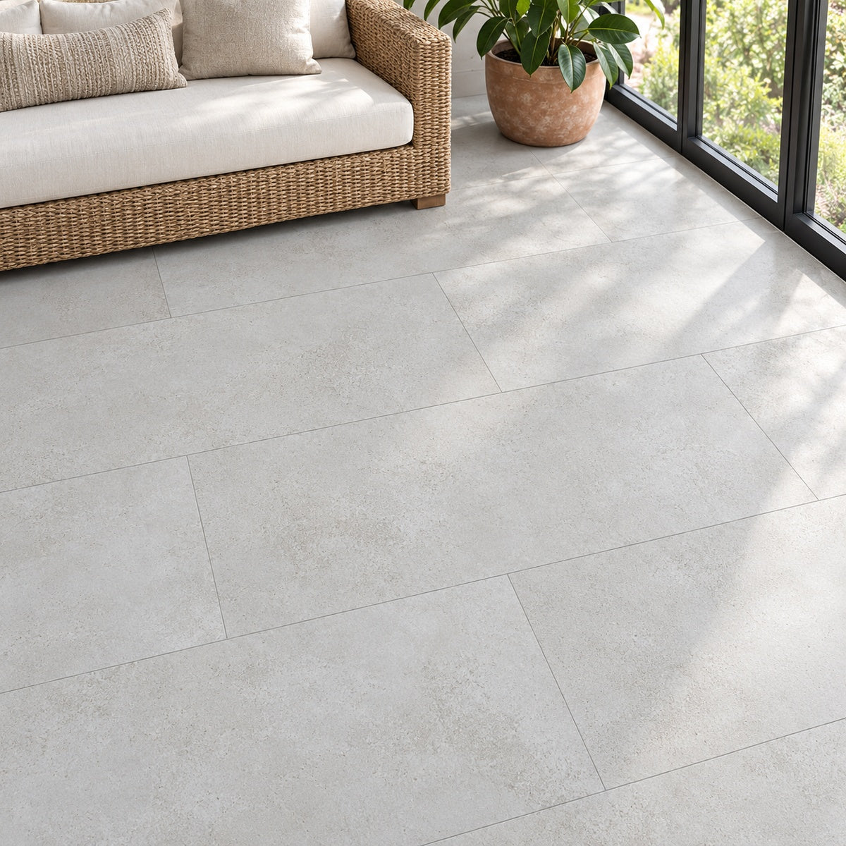 Manhattan Blanco 24x48 Porcelain Tile installed floor room scene