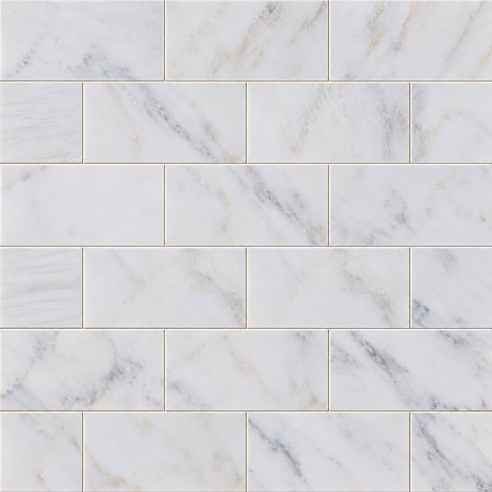 Calacatta Prestige 3x6 marble installed close-up