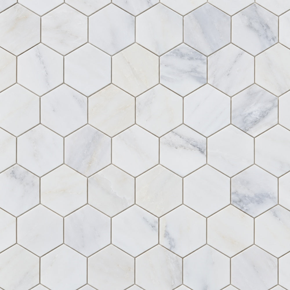 Calacatta Prestige 2-inch hexagon installed marble close-up