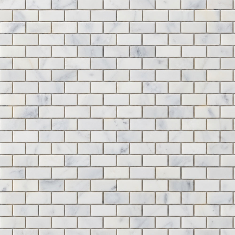 Calacatta Prestige baby brick 5/8 x 1-1/4 inch installed marble close-up