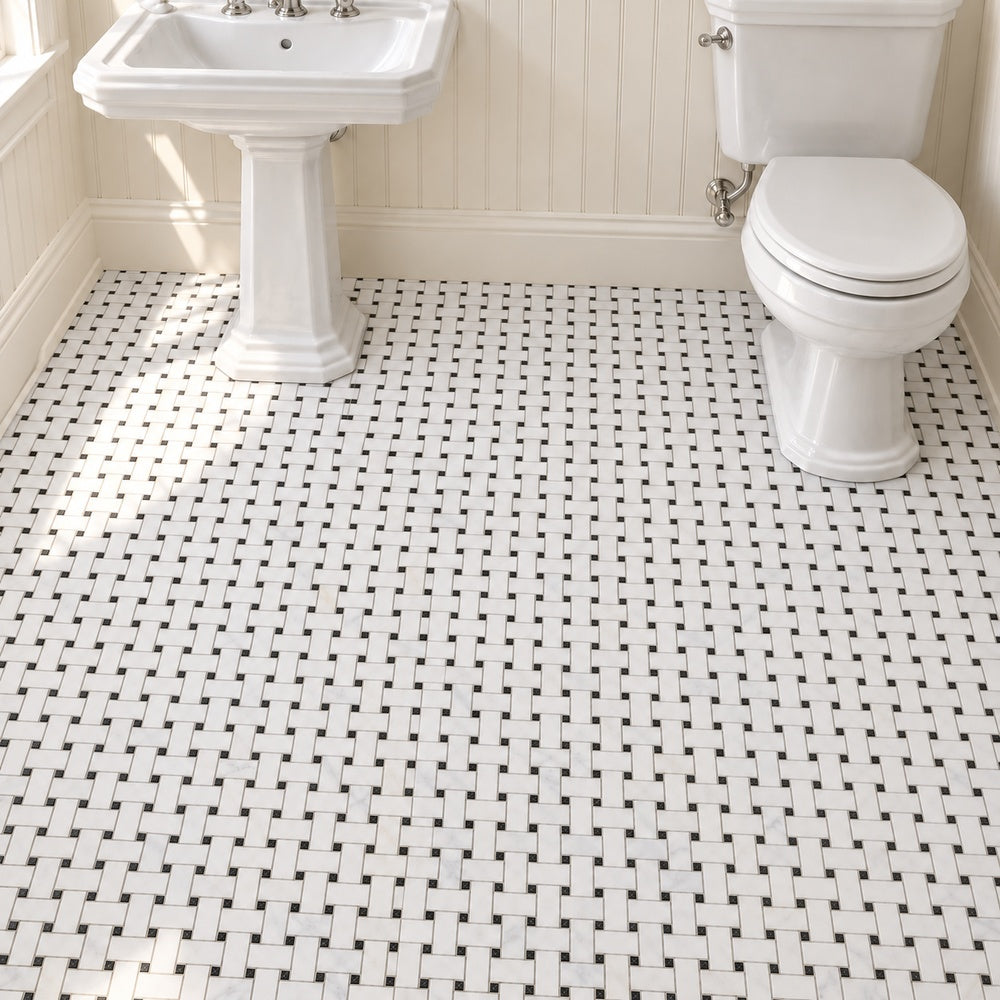 Calacatta Prestige basketweave with black marble dots bathroom floor room scene