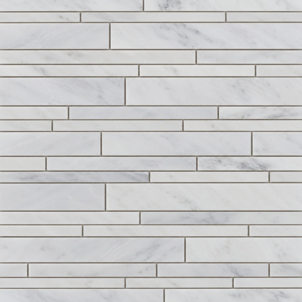 Calacatta Prestige random strip installed marble close-up