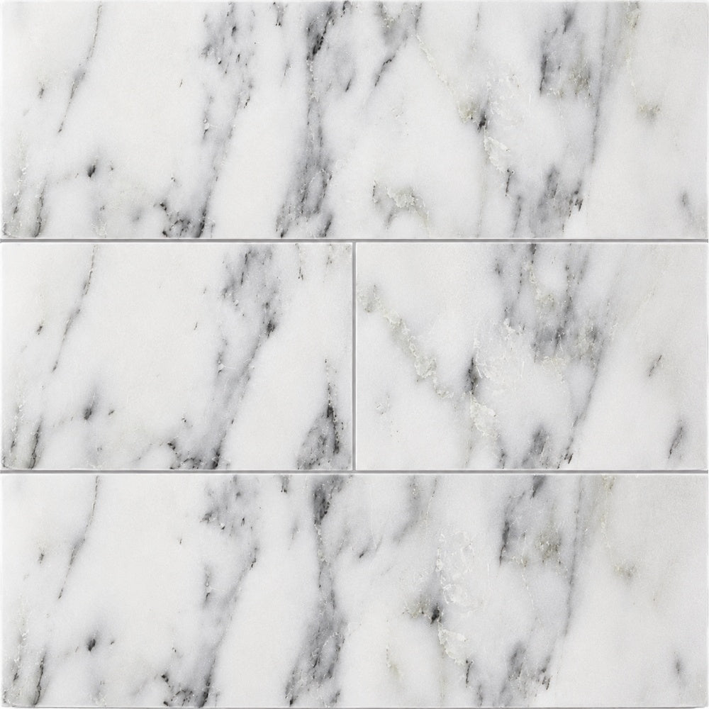 Calacatta Prestige 4x12 installed marble close-up
