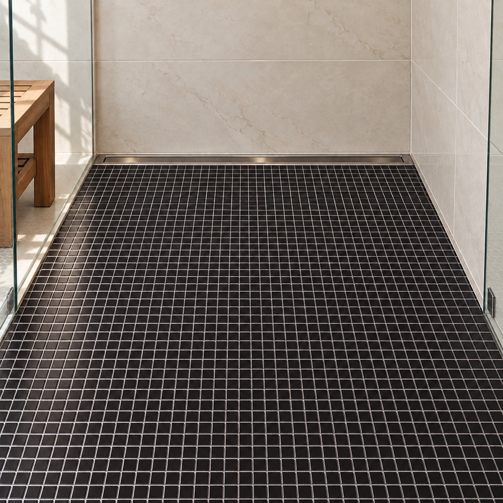 Simple Black 1x1 Square Ceramic Mosaic Matte installed in straight sheets on shower floor