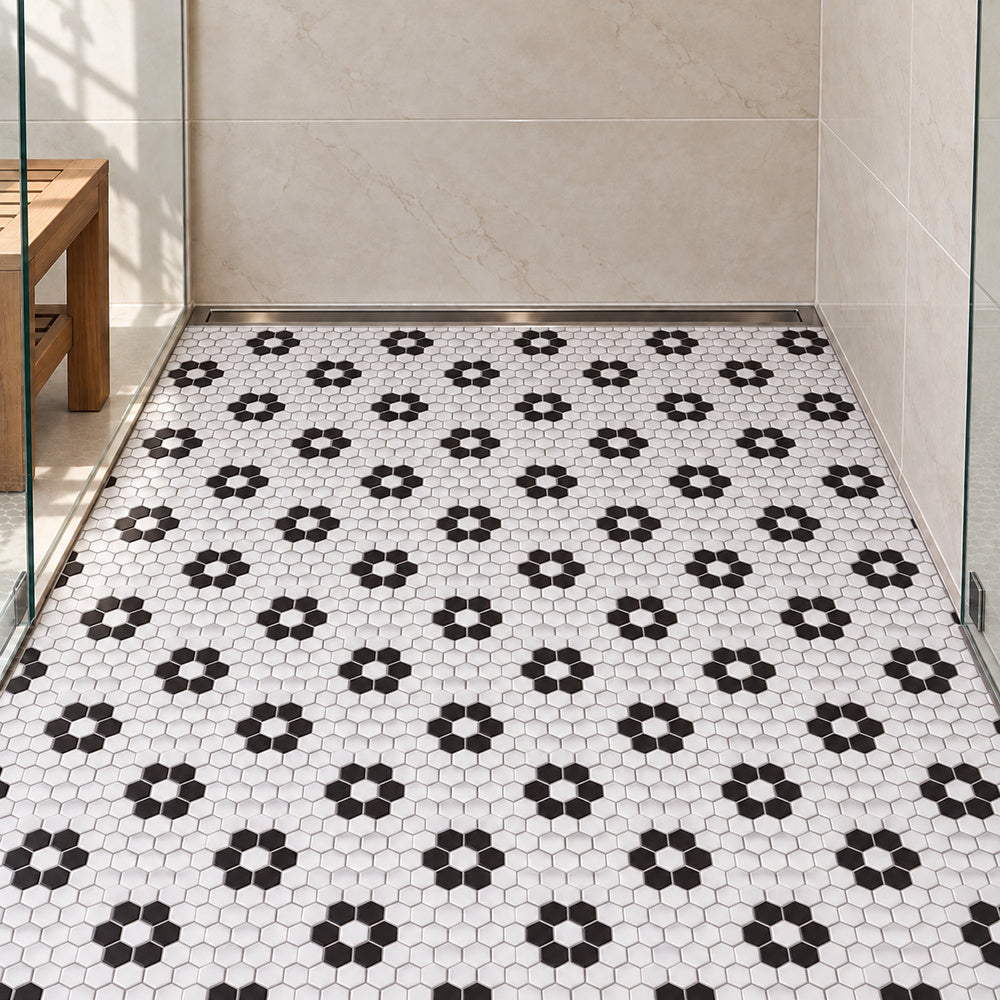Simple Black and White Flower Hexagon Ceramic Mosaic Matte installed on shower floor with aligned mosaic sheets