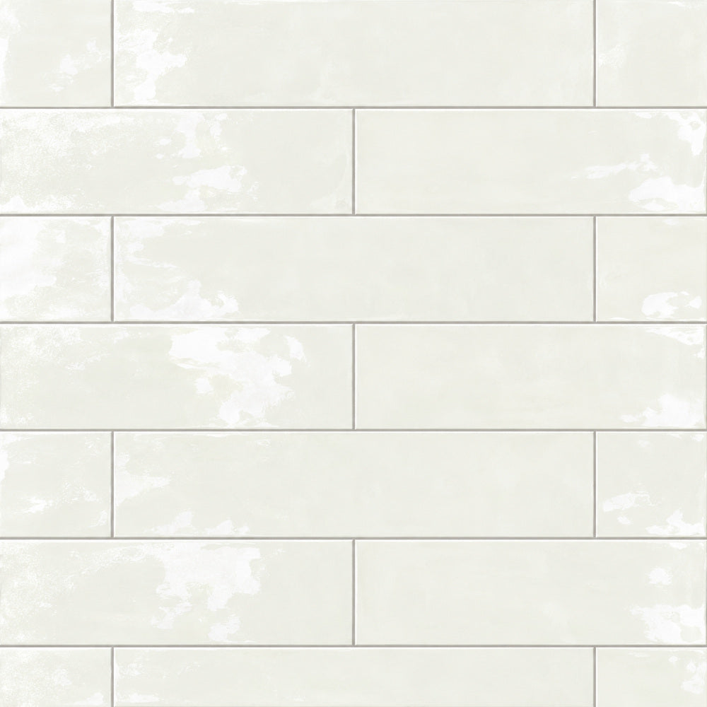 Solenne ivory 2x9 glossy porcelain tile close-up, half-offset rectangular layout
