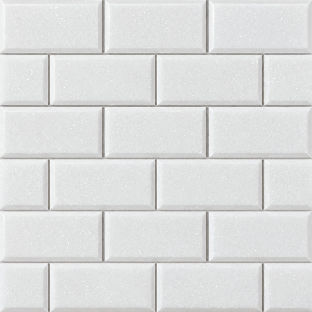 Thassos White beveled 2x4 marble subway tile close-up