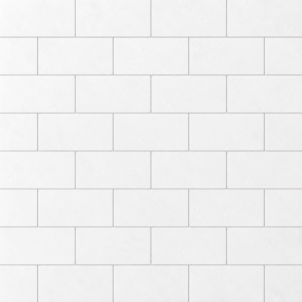 Thassos White flat 3x6 marble subway tile installed close-up