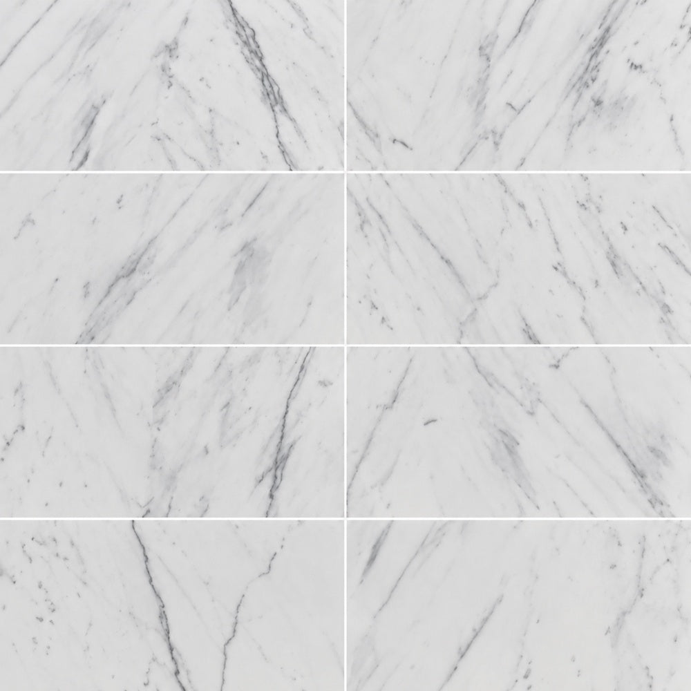 Statuario White 12x24 Honed Marble Field Tile — installed close-up