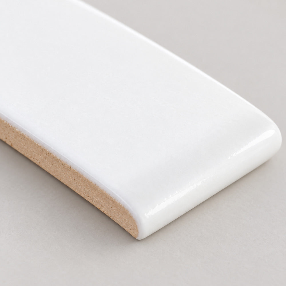 timeless ice white 3x6 short side bullnose ceramic tile macro
