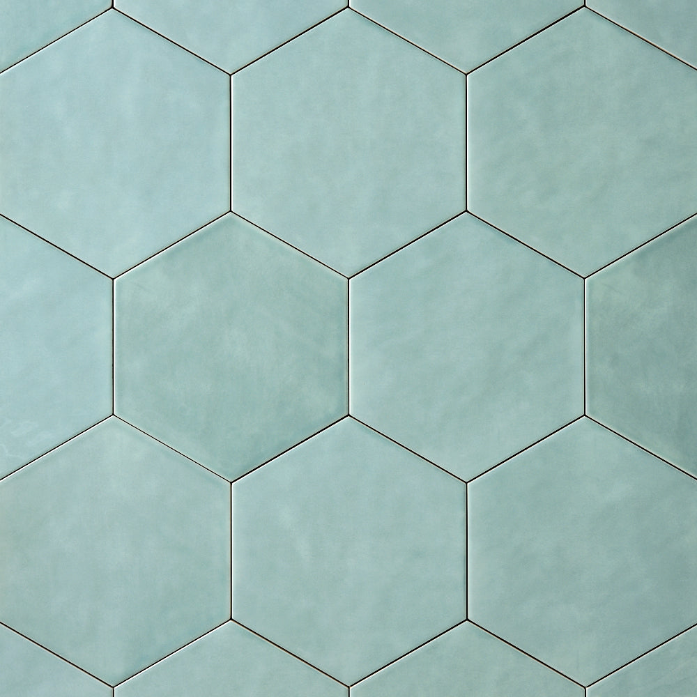 San Fran Aqua 7x8 Hexagon Ceramic Tile Glossy — installed close-up